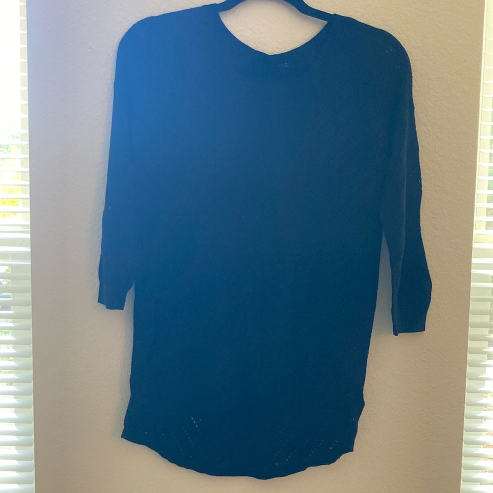 Quarter sleeve see through sweater